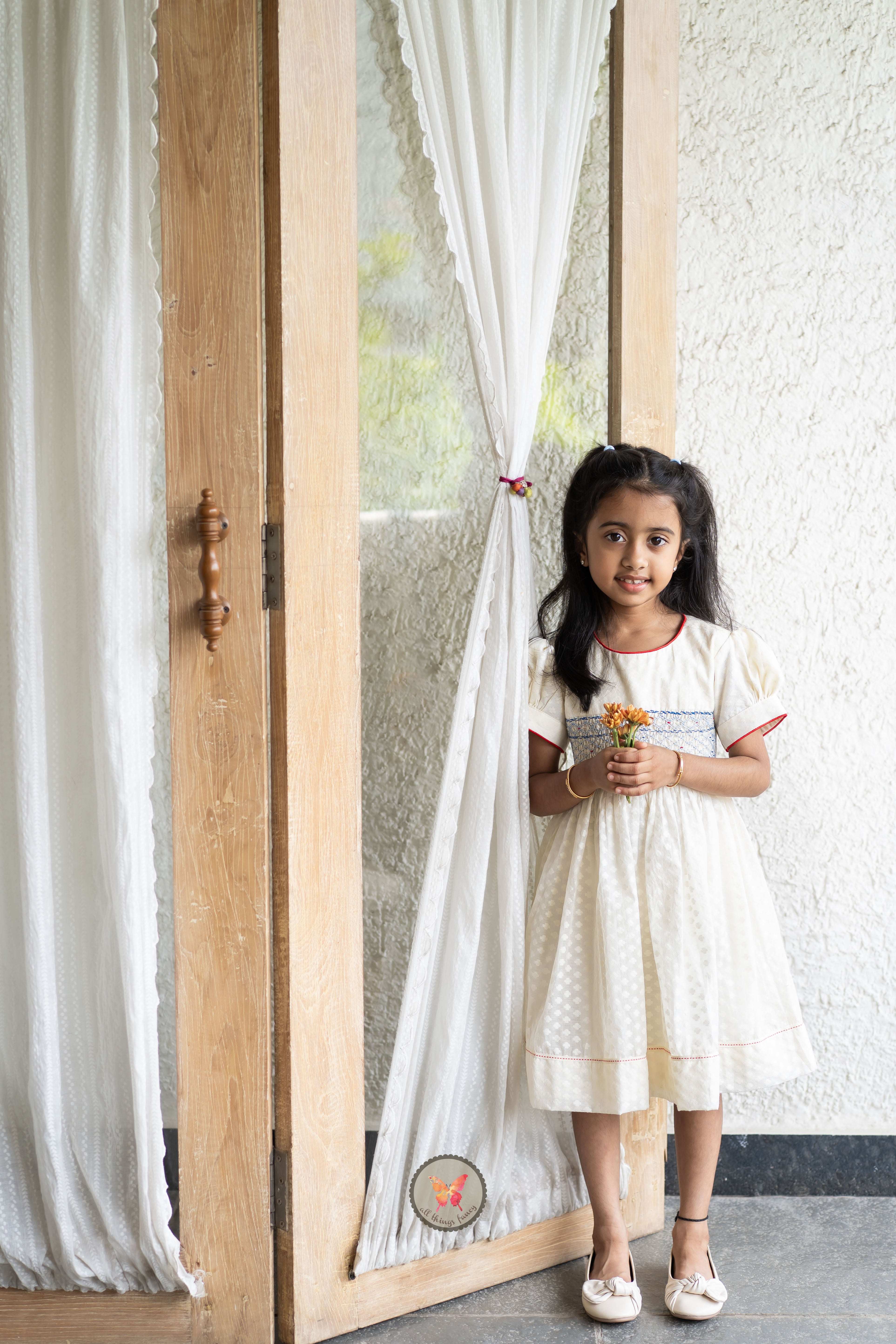 Textured Chanderi Handsmocked Frock