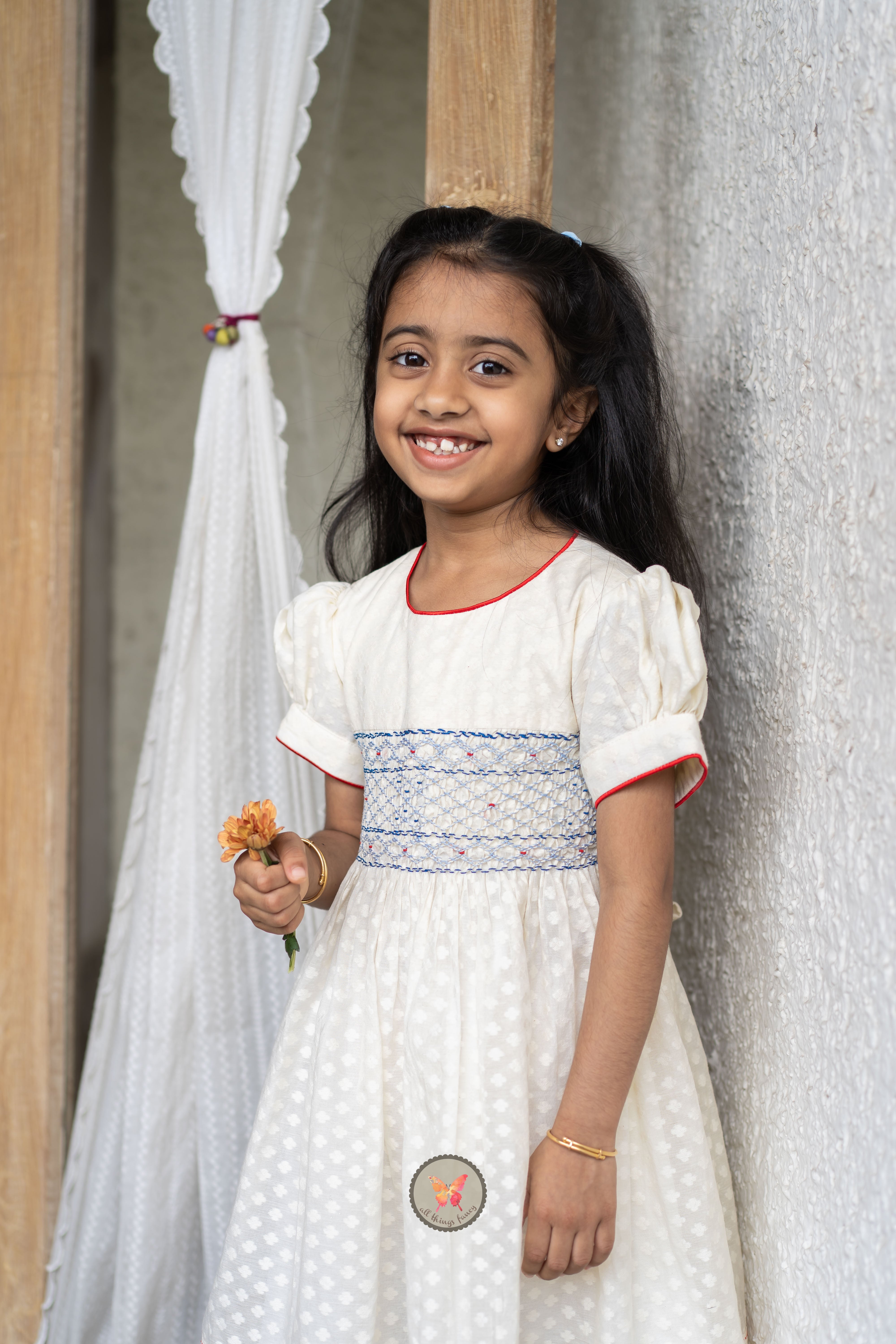 Textured Chanderi Handsmocked Frock