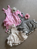 Load image into Gallery viewer, Striped Hamper of Ruffled Bum Rompers
